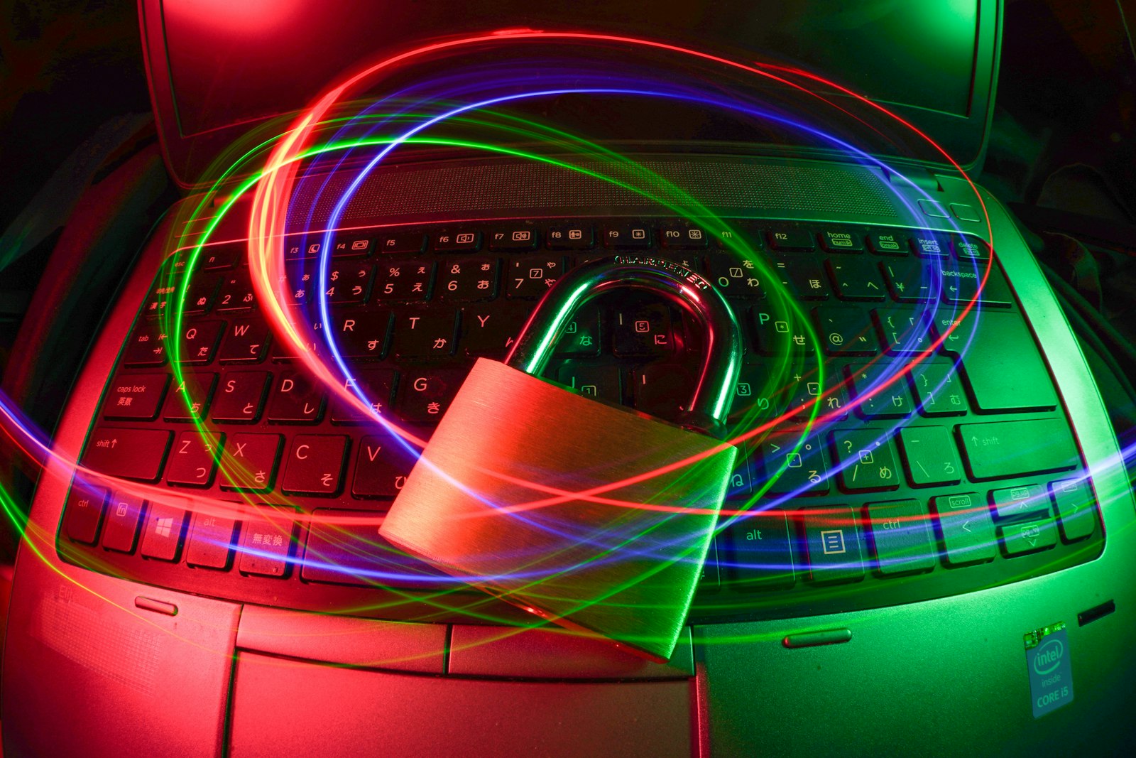 A red padlock on a computer keyboard